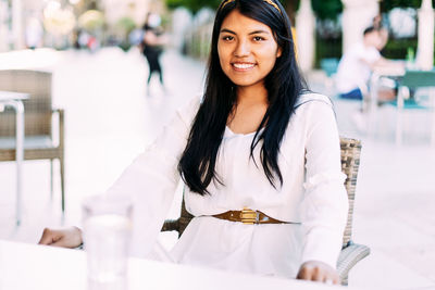 Portrait of smiling young woman