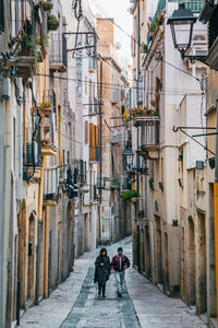 People walking on street in town