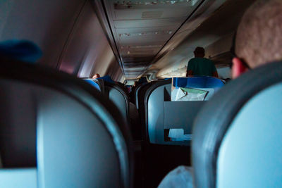 Rear view of people sitting in bus