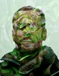 Double exposure portrait of man