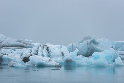 Melting icebergs, global warming, climate change floating in jokulsarlon glacial lagoon. iceland