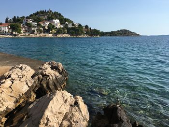 Scenic view of sea against clear sky