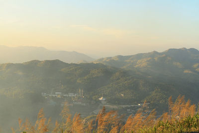 Scenic view of mountains against sky during sunset