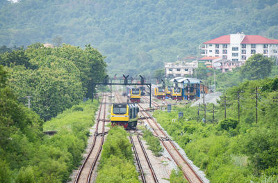 High angle view of train on railroad track amidst trees