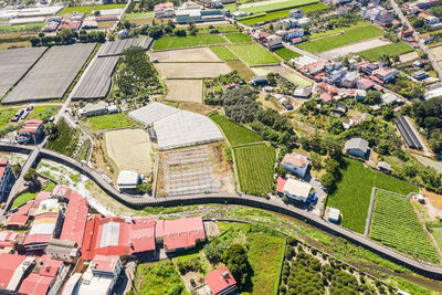 High angle view of street amidst buildings in city