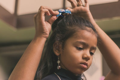 Close-up portrait of a girl looking away