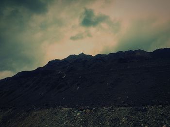 Scenic view of mountains against sky during sunset