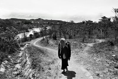 Woman standing on mountain