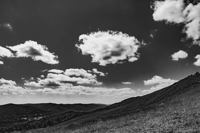 Low angle view of land against sky