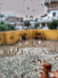 Full frame shot of wet window in rainy season