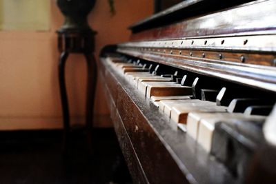 Close-up of piano at home