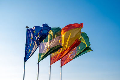 Flags on following order european union, andalusia, spain and granada