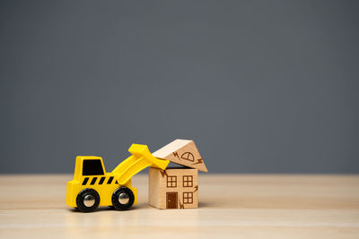 Close-up of toy blocks on table against black background