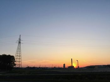 Electricity pylon at sunset