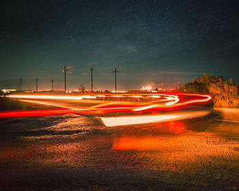 Light trails on road at night