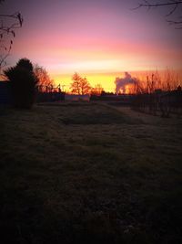 Scenic view of landscape at sunset