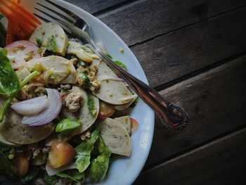 High angle view of vegetables in plate on table