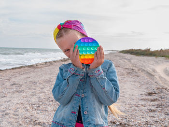 Happy child rainbow pop it toy having fun autumn sea trendy antistress sensory simple dimple fidget