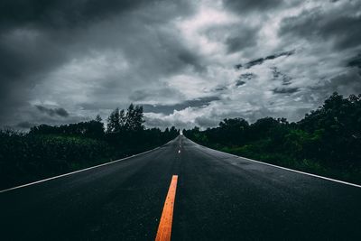 View of road against cloudy sky