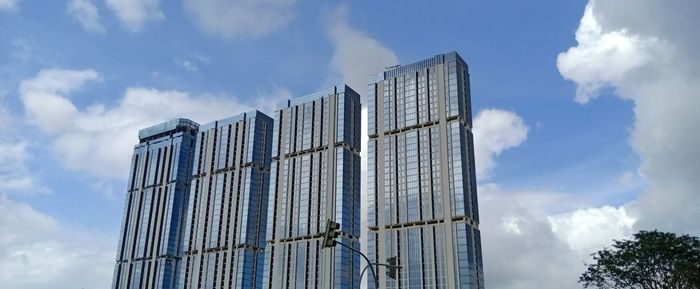 Low angle view of modern building against sky