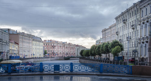Moyka river, blue bridge and embankment in st petersburg, russia