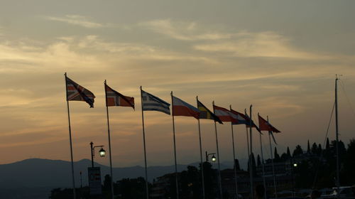 Flag against sky during sunset