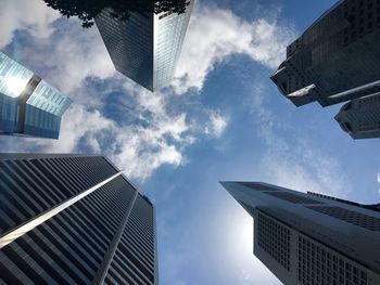 Low angle view of skyscrapers against sky