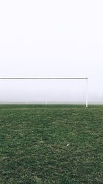 Soccer field against sky