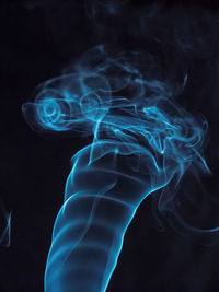 Close-up of smoke against black background