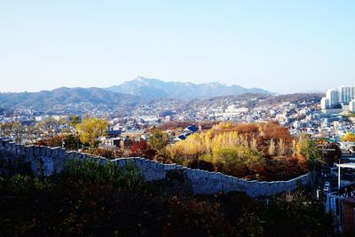 Panoramic view of cityscape against clear sky