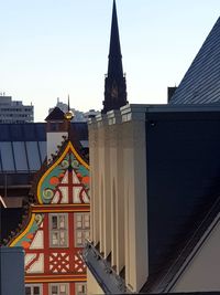 Exterior of buildings against sky in city