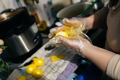 Midsection of woman washing hands