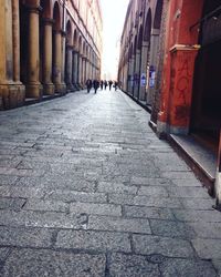 Narrow alley along buildings