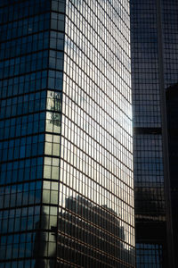 Low angle view of skyscrapers against sky