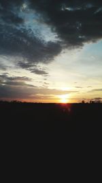 Scenic view of silhouette landscape against sky during sunset