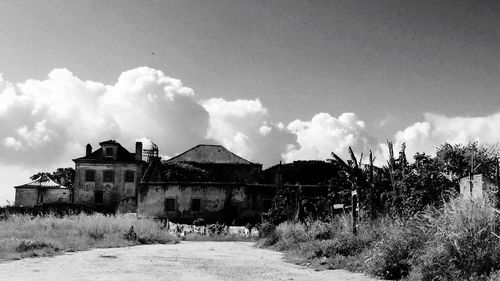 Built structure against cloudy sky