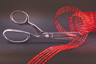 Close-up of eyeglasses on table against black background