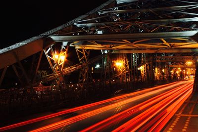 Light trails on bridge at night