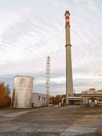 Low angle view of factory against sky