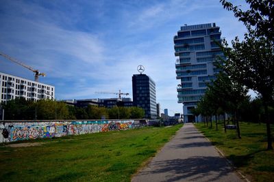 View of footpath with buildings in background