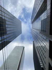 Low angle view of skyscrapers against sky