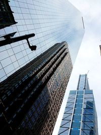 Low angle view of skyscrapers against sky