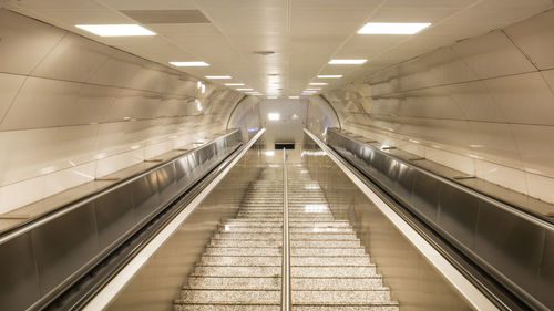 Interior of illuminated subway station