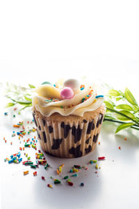 Close-up of cupcakes against white background