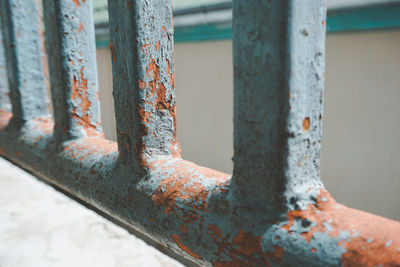 Close-up of rusty metal fence