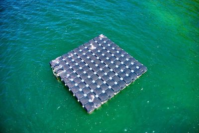 High angle view of plastic floating on sea