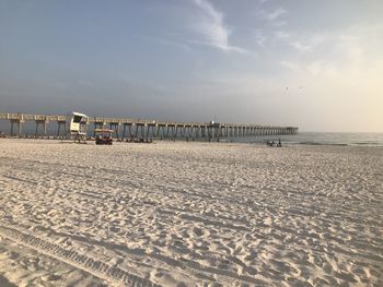 Scenic view of beach against sky