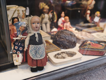 Close-up of dolls for sale