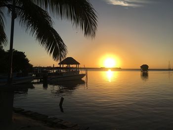 Scenic view of swimming pool against sky during sunset