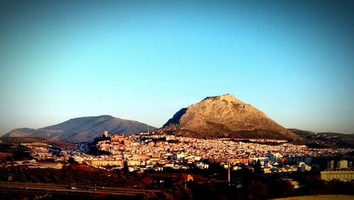 Cityscape against clear sky